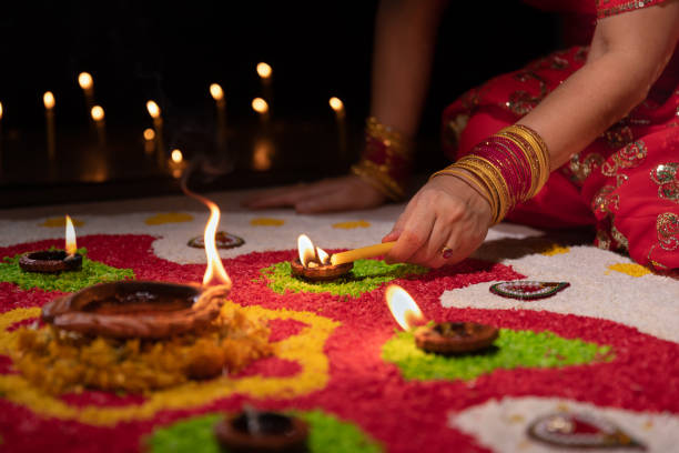 istock Traditional diya lamps lit during diwali celebration 1414332751