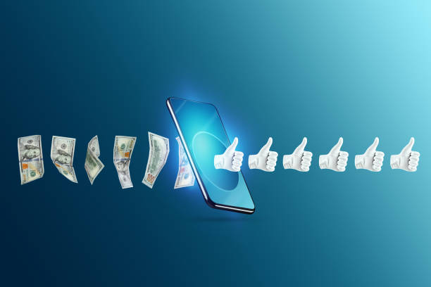 istock Content monetization, likes turn into dollars passing through the smartphone. The concept of new currency, social networks, freelancing, monetization of subscribers and followers. 1414338494
