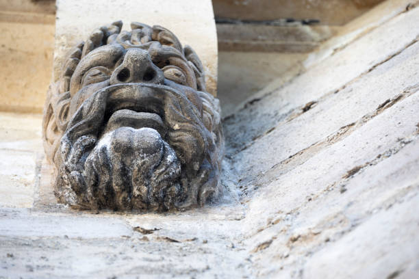 One of many mascarons which decorate the sides of Pont Neuf, Paris
