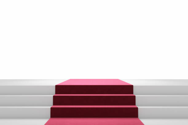 istock Middle red carpet white stairs step stage stand white background. Luxurious walkway to celebrations party display performances or Hollywood. 1414353125