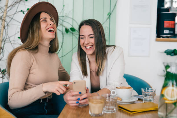istock woman friends in cafeteria 1414353356