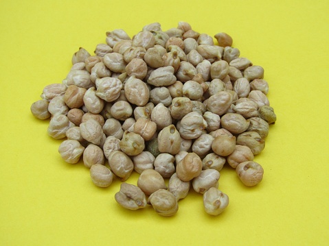 chickpeas on yellow background