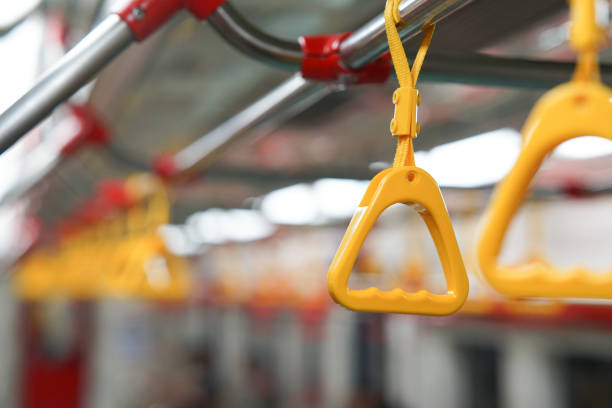 istock yellow hanging handle grip on public transportation such as bus and train 1414369300