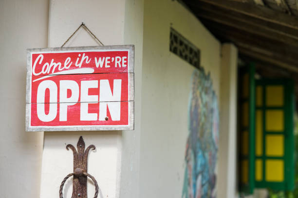 istock Open Sign Hanging on the wall 1414370003