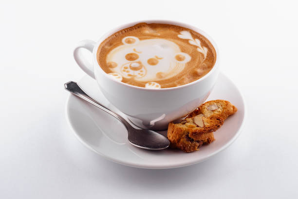 White cup cappuccino coffee with a latte-art pattern in the form of a bear