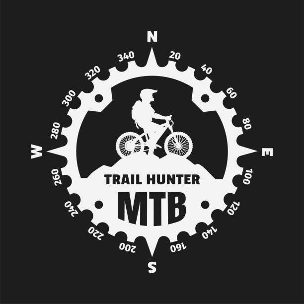 illustrazioni stock, clip art, cartoni animati e icone di tendenza di mountain biker, sotto forma di bussola su uno sfondo scuro. - mountain bike