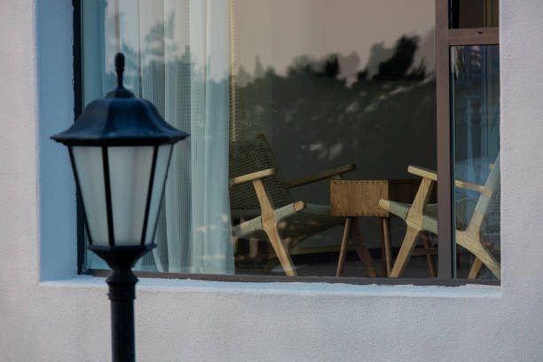 istock Chair in front of the window￼ 1414376896