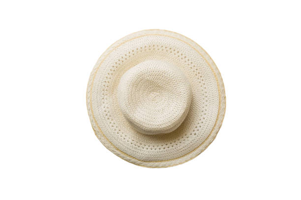 istock Womens summer yellow straw hat top view, isolated on white background 1414378344