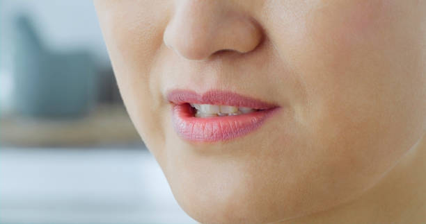 istock Pink lips of woman 1414378715