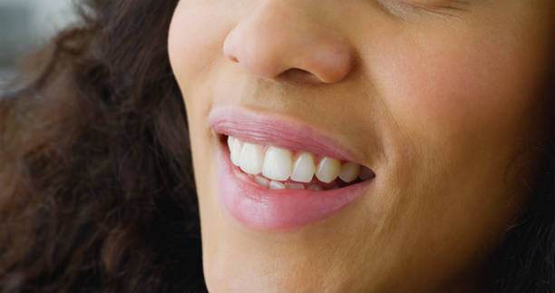 istock Pink lips of young woman 1414378716