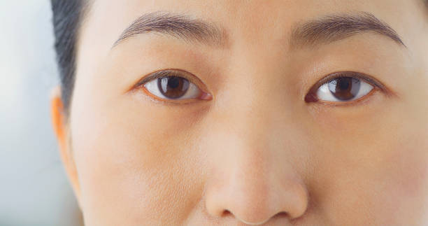 istock Serious woman looking into camera 1414378731