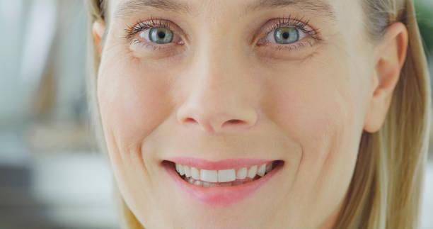 istock Happy woman looking into camera 1414378734