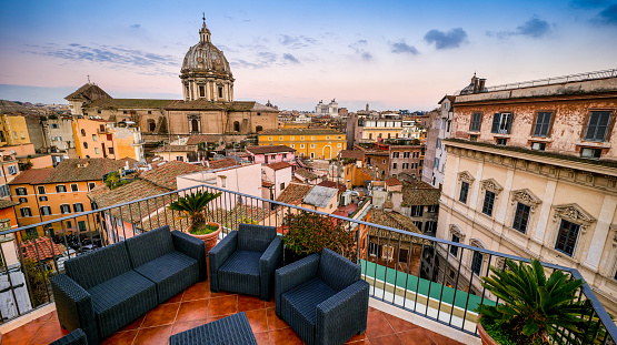 An idyllic cityscape of the Baroque heart of Rome seen from a terrace in Campo de Fiori