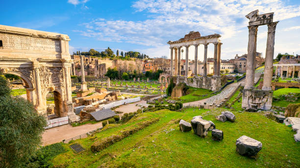 A suggestive glimpse of the Roman Forum with the Arch of Septimius Severus seen from the Capitoline Hill of Rome stock photo