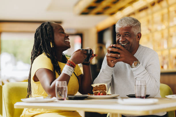 istock Happy senior couple having coffee together in a cafe 1414382933