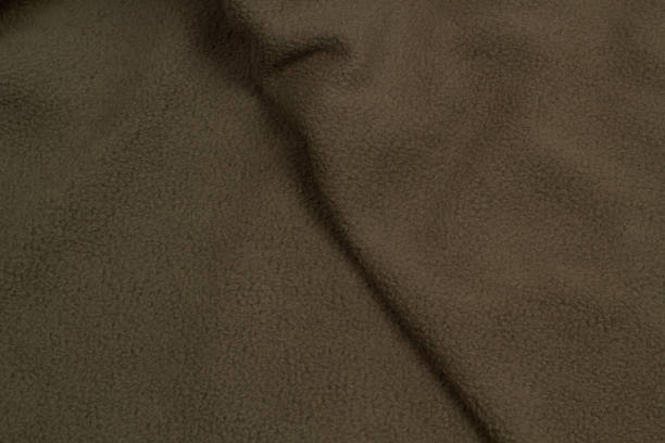 istock Fleece fabric top view. Texture of textile fleece bedspread. 1414386220