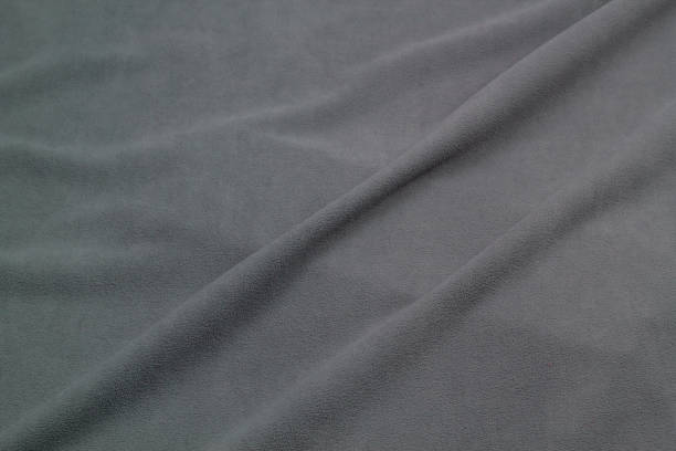 istock Fleece fabric top view. Texture of textile fleece bedspread. 1414386226