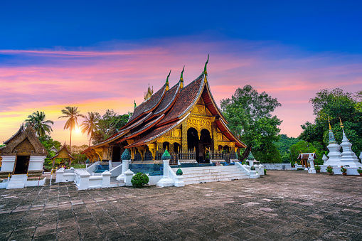 Wat Xieng Thong (Golden City Temple) at sunset in Luang Prabang, Laos.