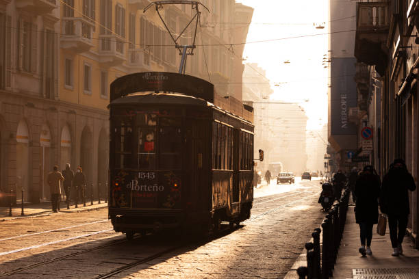 Old vintage tram on the street of Milan, Italy Milan, Italy - January 23, 2022: Old vintage tram on the street on January 23, 2022 milan fashion week stock pictures, royalty-free photos & images