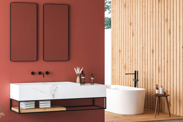 istock Modern bathroom interior with red and wooden walls, marble basin with double mirror 1414397292