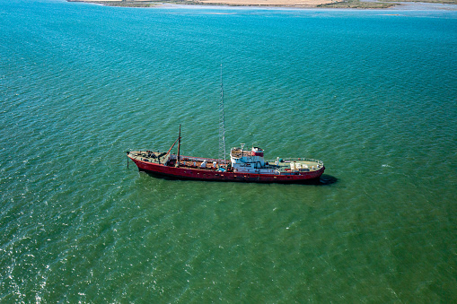 Aerial photo from a drone of the MV Ross Revenge home of Radio Caroline moored on the River Blackwater, Essex.