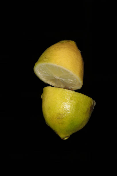 Fresh lemons - one whole and two halves