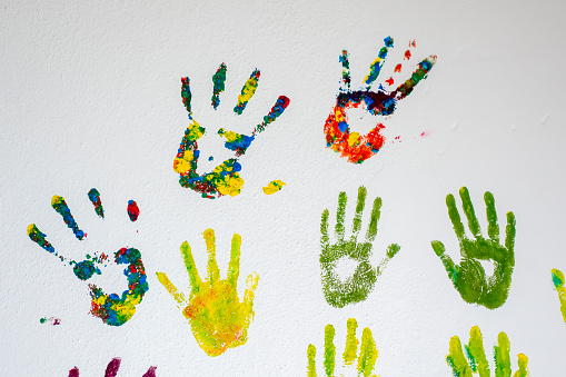 Human hand and painted hands.