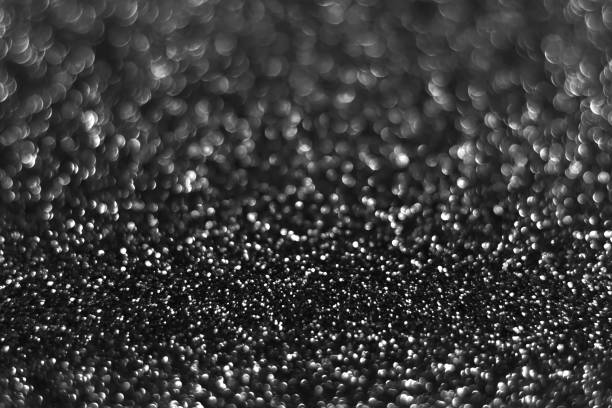 istock Gray black sparkling glitter bokeh background 1414401194