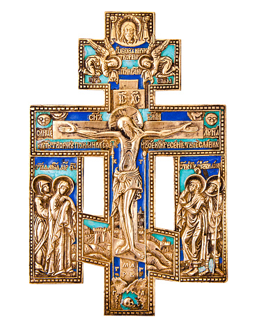 Antique orthodox enamel cross isolated on white background