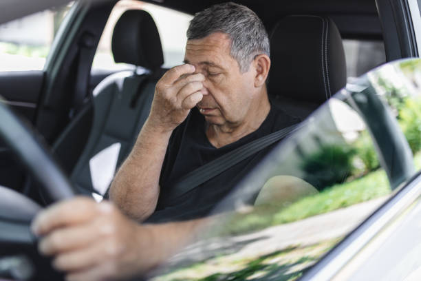 istock Tired pensioner dring in a car 1414402160