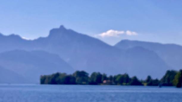 istock View over lake to a mountain looking like a womans profil 1414402307