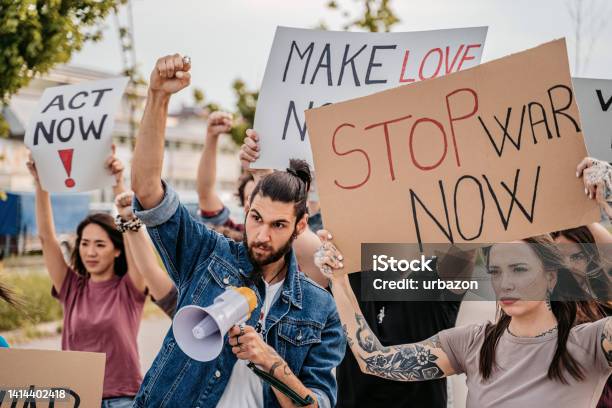 People Protesting Against War Stock Photo - Download Image Now - Activist, Adult, African Ethnicity