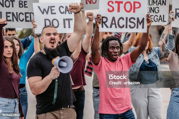 People Protesting Against Racism Stock Photo - Download Image Now - Racism, African Ethnicity, African-American Ethnicity