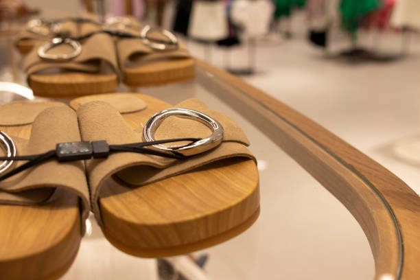 istock Women's sandals, brown strap and wooden sole. 1414405350