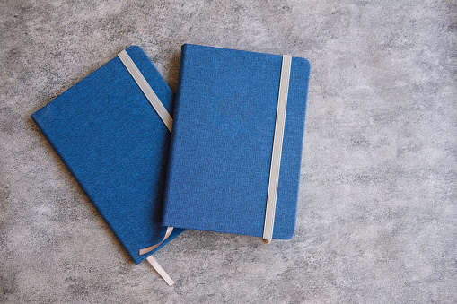 Dark blue closed notebook mockup. Business work notepad