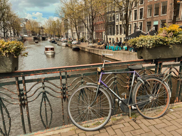 istock Amsterdam canal and bicycle 1414406466