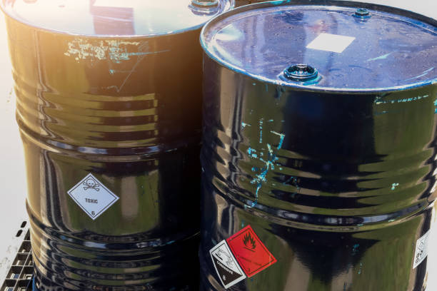 istock Warning symbol for chemical hazard on chemical container 1414417784