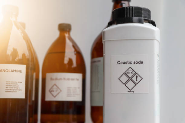 istock caustic soda in bottle, chemical in the laboratory 1414417808