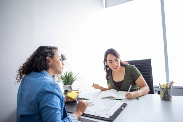 istock women working in an office 1414432470