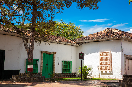 Santa Fe de Antioquia, , Colombia - November, 2017: Antique houses around the Jesus Nazareno square at the beautiful colonial town of Santa Fe de Antioquia in Colombia