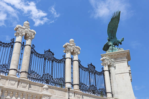 Turul bird statue on a pole in Budapest city, Hungary