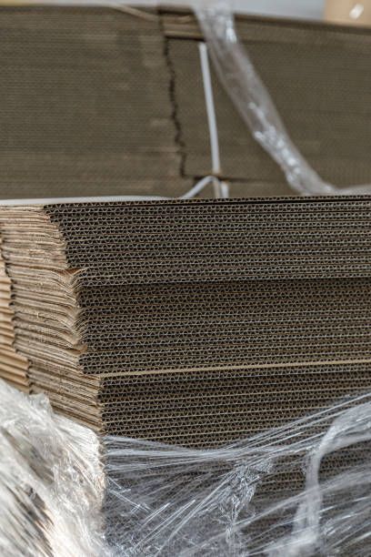 istock New folded paperboard boxes in a stock 1414436870
