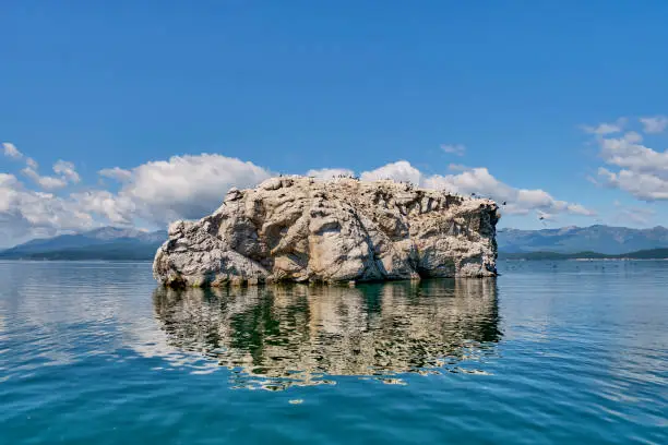 Photo of White Stone Island, Belyy Kamen. Chivyrkuisky Bay of Lake Baikal. Zabaikalsky National Park, Russia