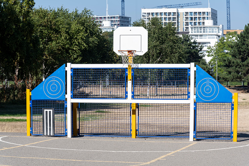 The ideal facility for children to play football and basketball. It also has two wooden targets and cricket stumps. Beautiful sunny day in London.