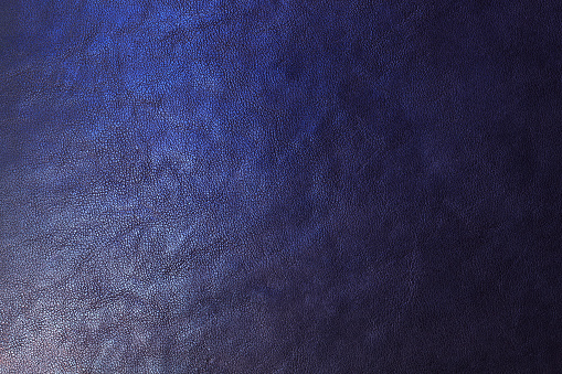 Texture leather is illuminated multicolor.