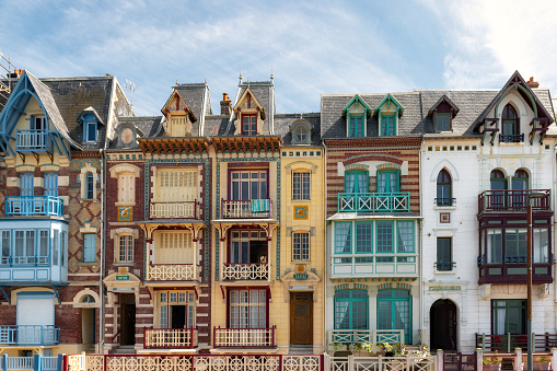 old houses at historic beach promenade in Mers- Les -Bains, France