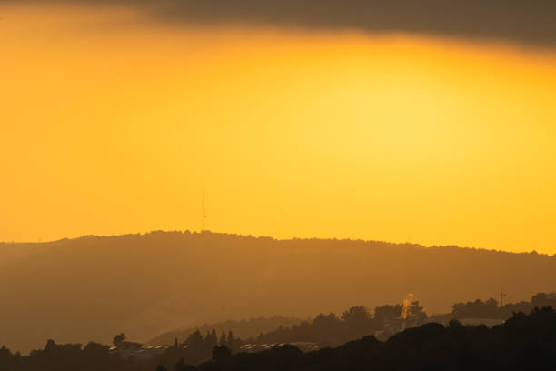 istock Orange horizon with beautiful view of hill 1414448027