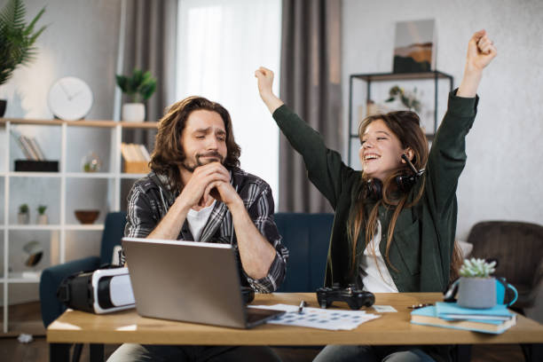 istock The woman winning from the man. 1414451579