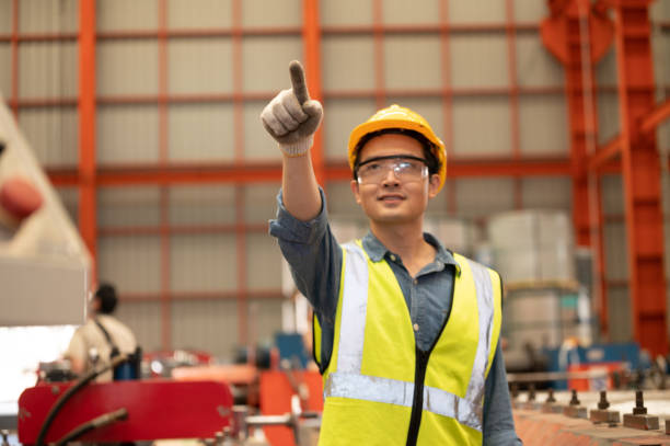 istock Asian man engineer  working hard in factory , worker employee  hard hat safety control machine factory 1414451721