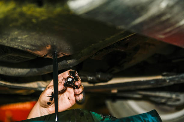 istock Oil change of a car engine. 1414459677